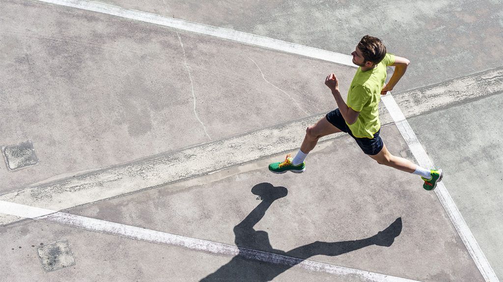 man running, bird's eye view