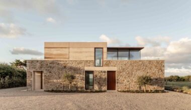 Fieldwork completes rammed-earth house in Jersey