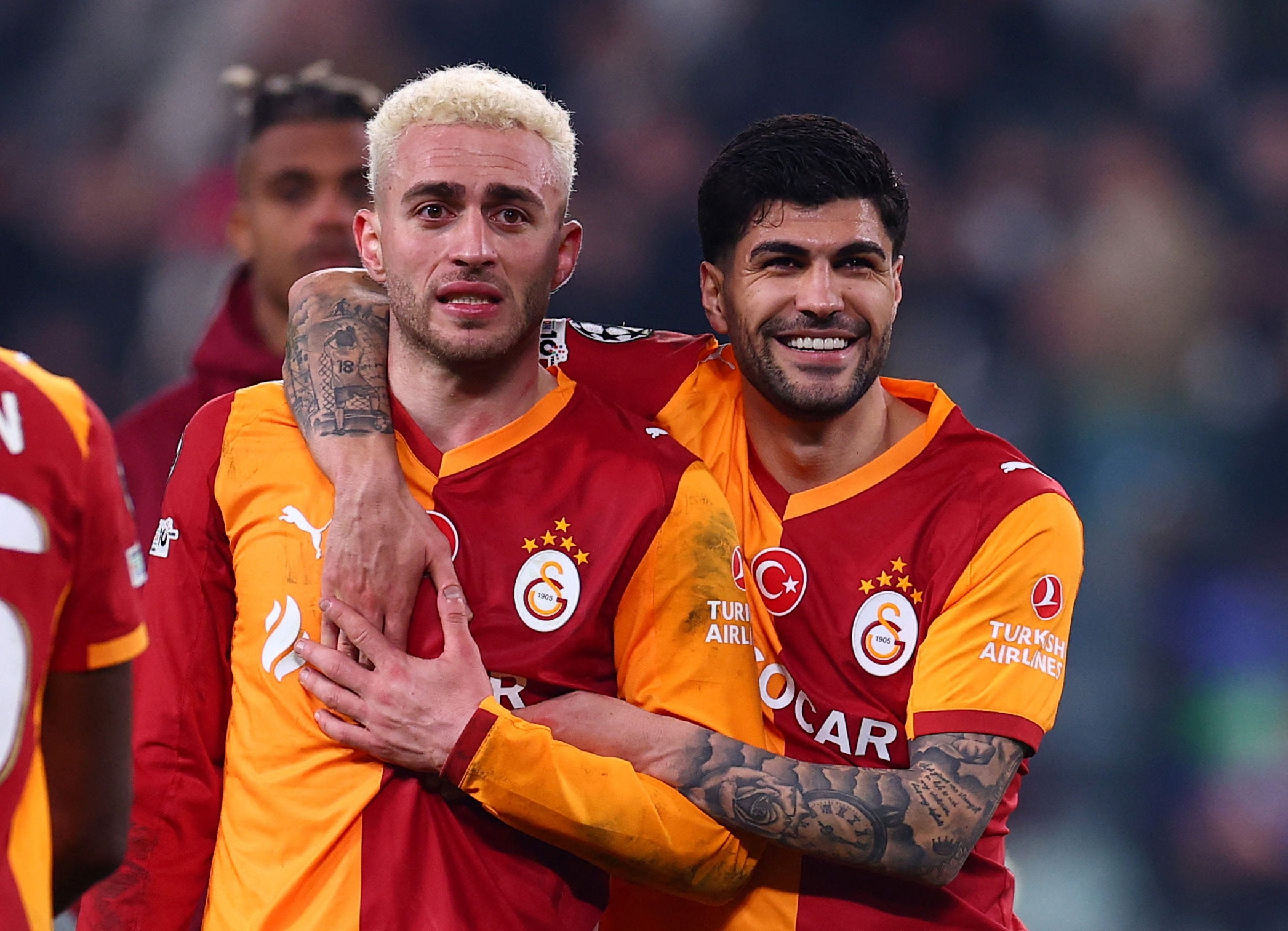 Galatasaray’s Baris Alper Yilmaz and Eren Elmali celebrate after eliminating Juventus