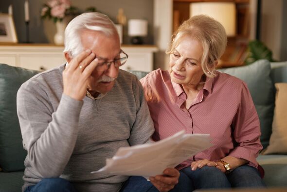 Couple looking at bills Couple looking at bills