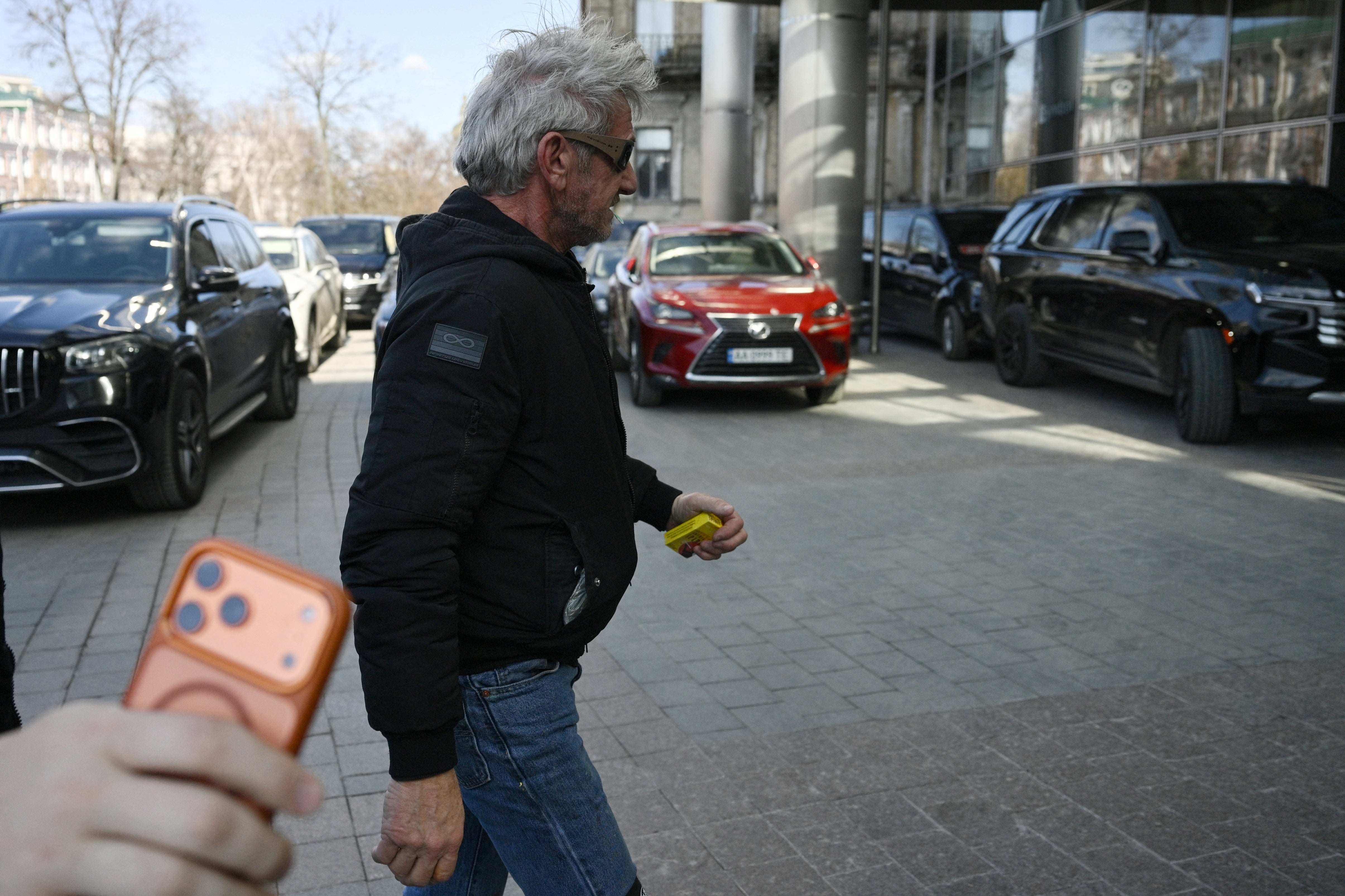 US actor Sean Penn walks down a street in Kyiv