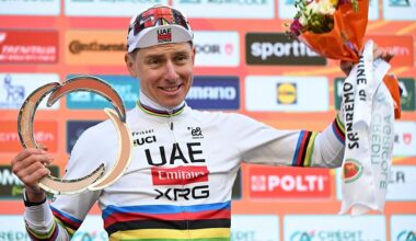 Slovenian Tadej Pogacar of UAE Team Emirates-XRG celebrates on the podium after winning the