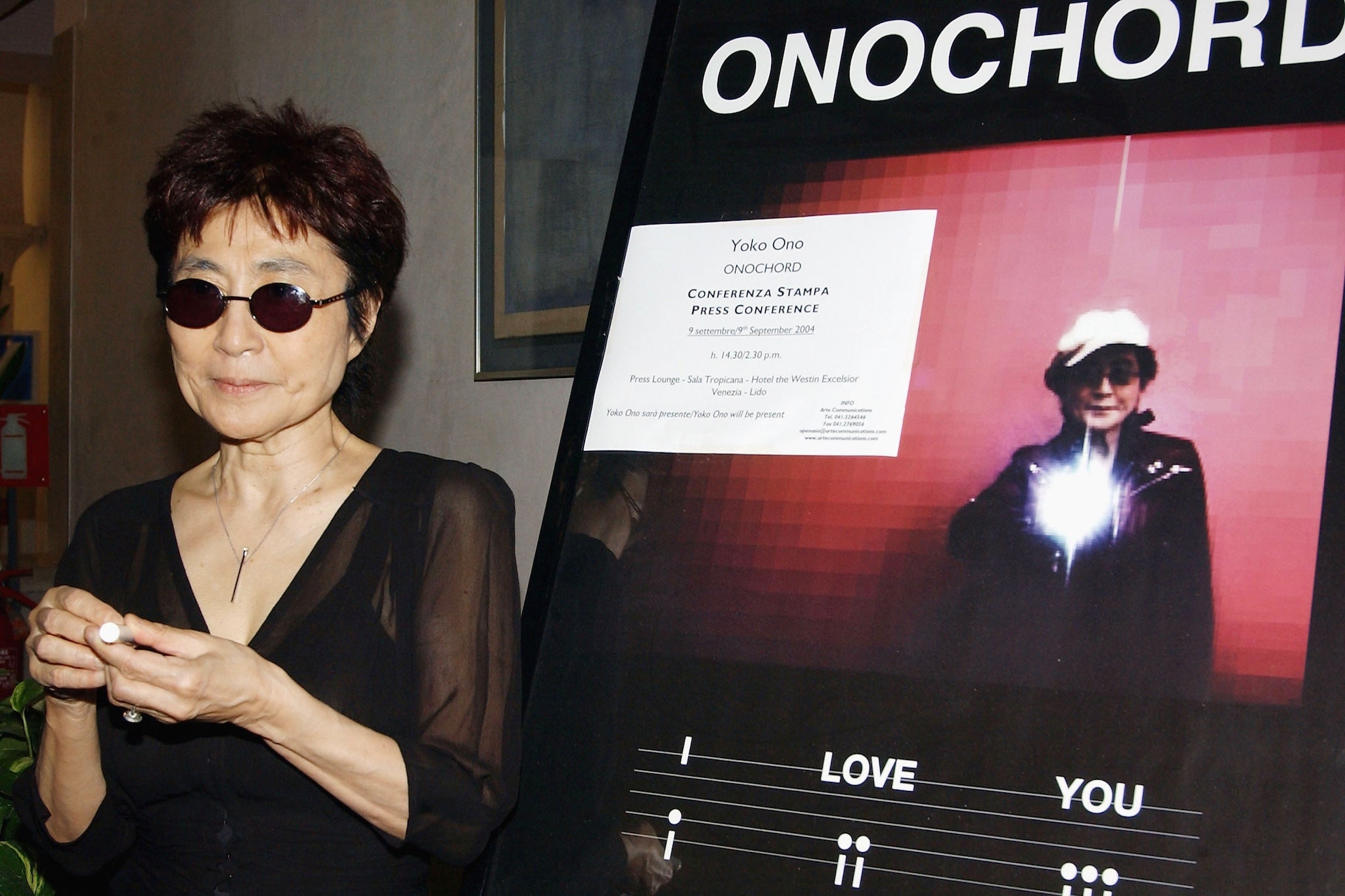 Yoko Ono performs her video installation ‘Onochord’ at the Excelsior Hotel during the Venice Film Festival, on 9 September 2004