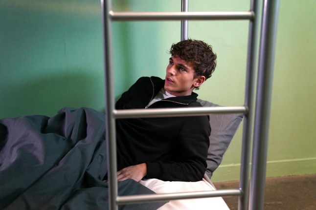 Lucas Hay (Oscar Curtis) is spooked while lying on his prison bed in Hollyoaks