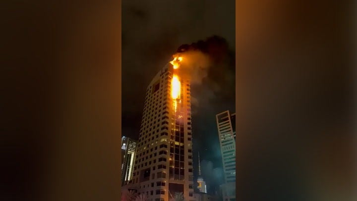 A government building in Kuwait is engulfed by flames after a reported drone attack