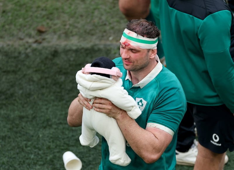 Tadhg Beirne celebrates with his daughter Penelope after the Scotland match. Photograph: Inpho
