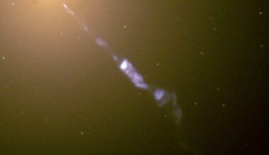 The elliptical galaxy M87 emitting a relativistic jet. When the jet points at Earth it is classed as a blazar and it is these that are thought to have generated some of the most energetic particle yet. (Credit : NASA and The Hubble Heritage Team)