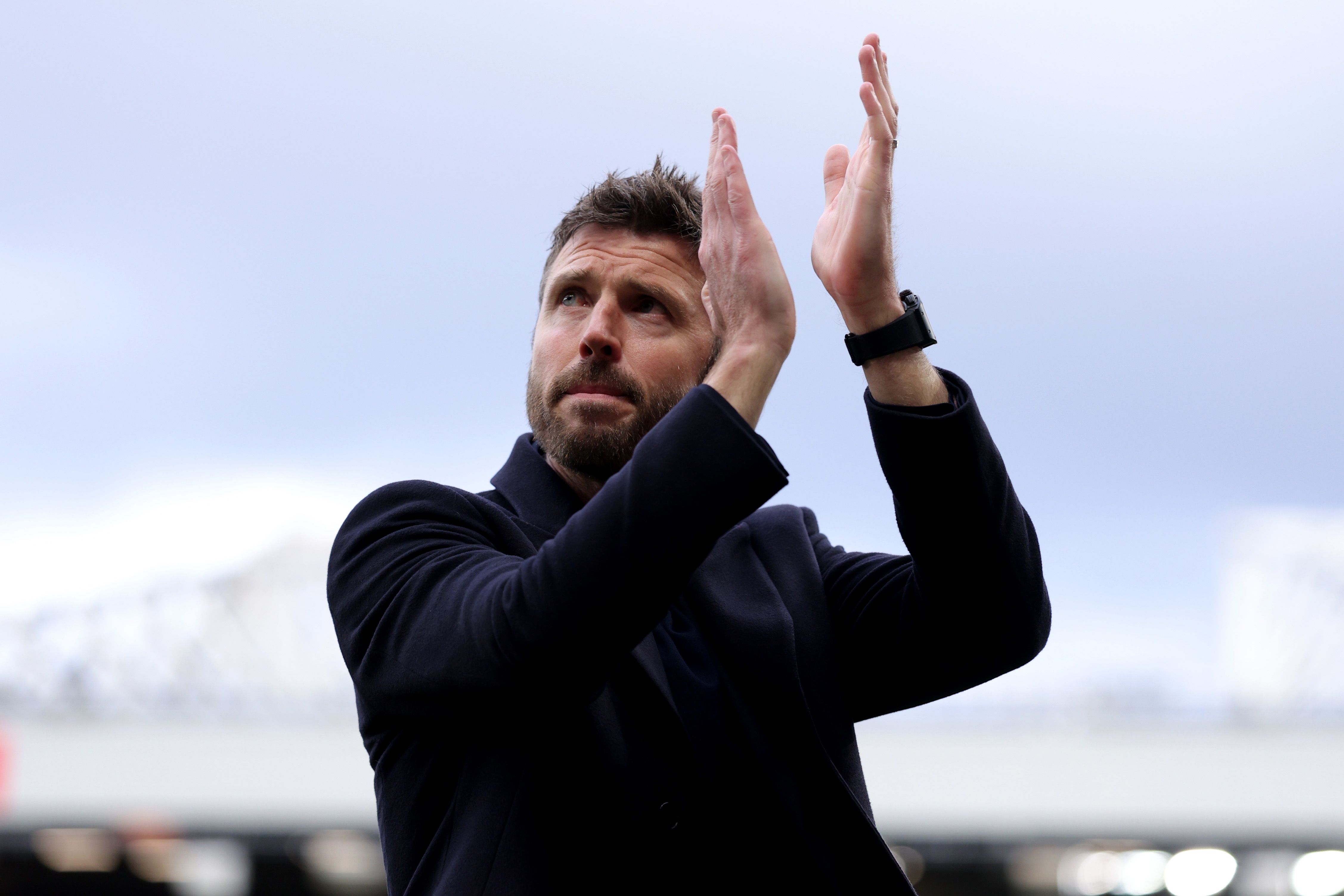 Michael Carrick claps his hands during Manchester United game.