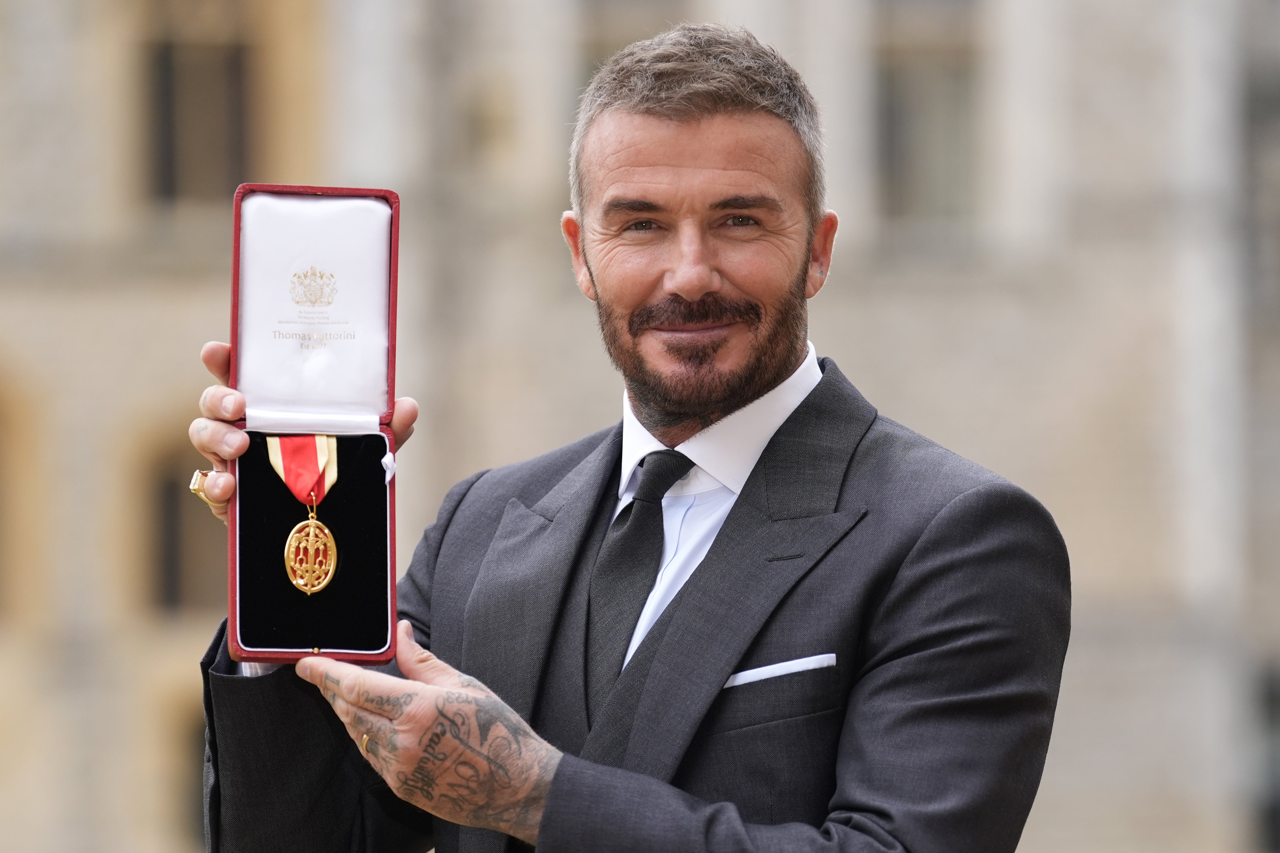Beckham received his knighthood from the King in November