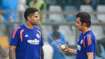 India's captain Suryakumar Yadav, left, with head coach Gautam Gambhir. (PTI)