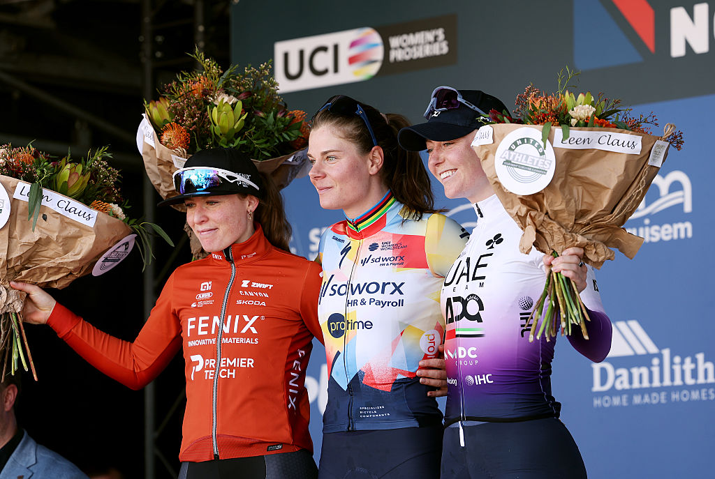 NOKERE, BELGIUM - MARCH 18: (L-R) Charlotte Kool of Netherlands and Team Fenix-Premier Tech on second place, race winner Lotte Kopecky of Belgium and Team SD Worx - Protime and Lara Gillespie of Ireland and UAE Team ADQ on third place pose on the podium ceremony after the 7th Danilith Nokere Koerse 2026, Women&amp;apos;s Elite a 133.3km one day race from Deinze to Nokere / #UCIWWT / on March 18, 2026 in Nokere, Belgium. (Photo by Rhode Van Elsen/Getty Images)