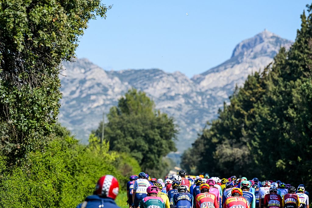 The pack of riders pictured in action during the sixth stage of 84th edition of the Paris-Nice cycling race, a race from Barbentane to Apt (179,3 km), on Friday 13 March 2026. BELGA PHOTO DAVID PINTENS (Photo by DAVID PINTENS / BELGA MAG / Belga via AFP)