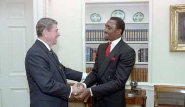 President Ronald Reagan shaking hands with boxer Thomas “Hitman” Hearns in the Oval Office in 1987.