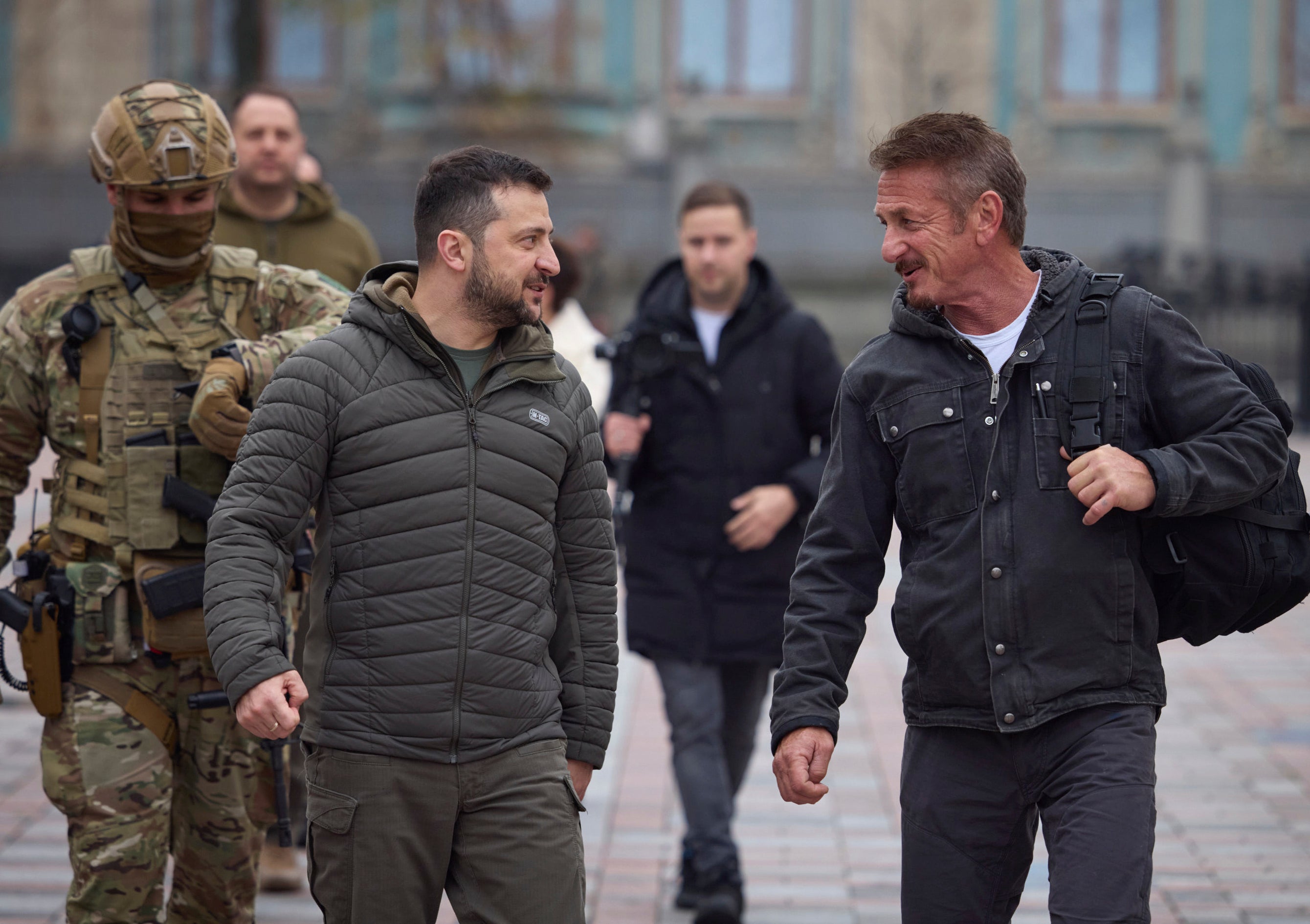 Ukrainian president Volodymyr Zelensky walks with US actor Sean Penn after their meeting in Kyiv