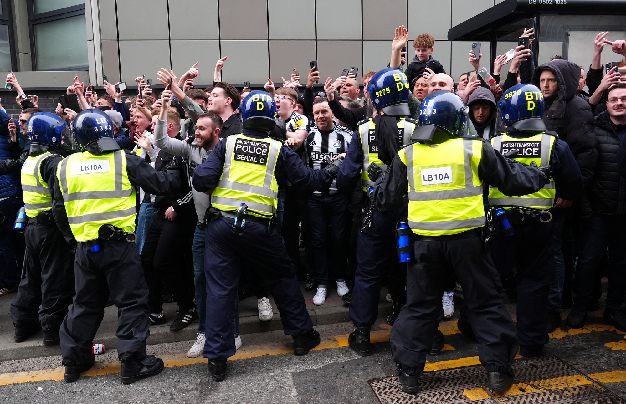 Police tried to restrain Newcastle fans