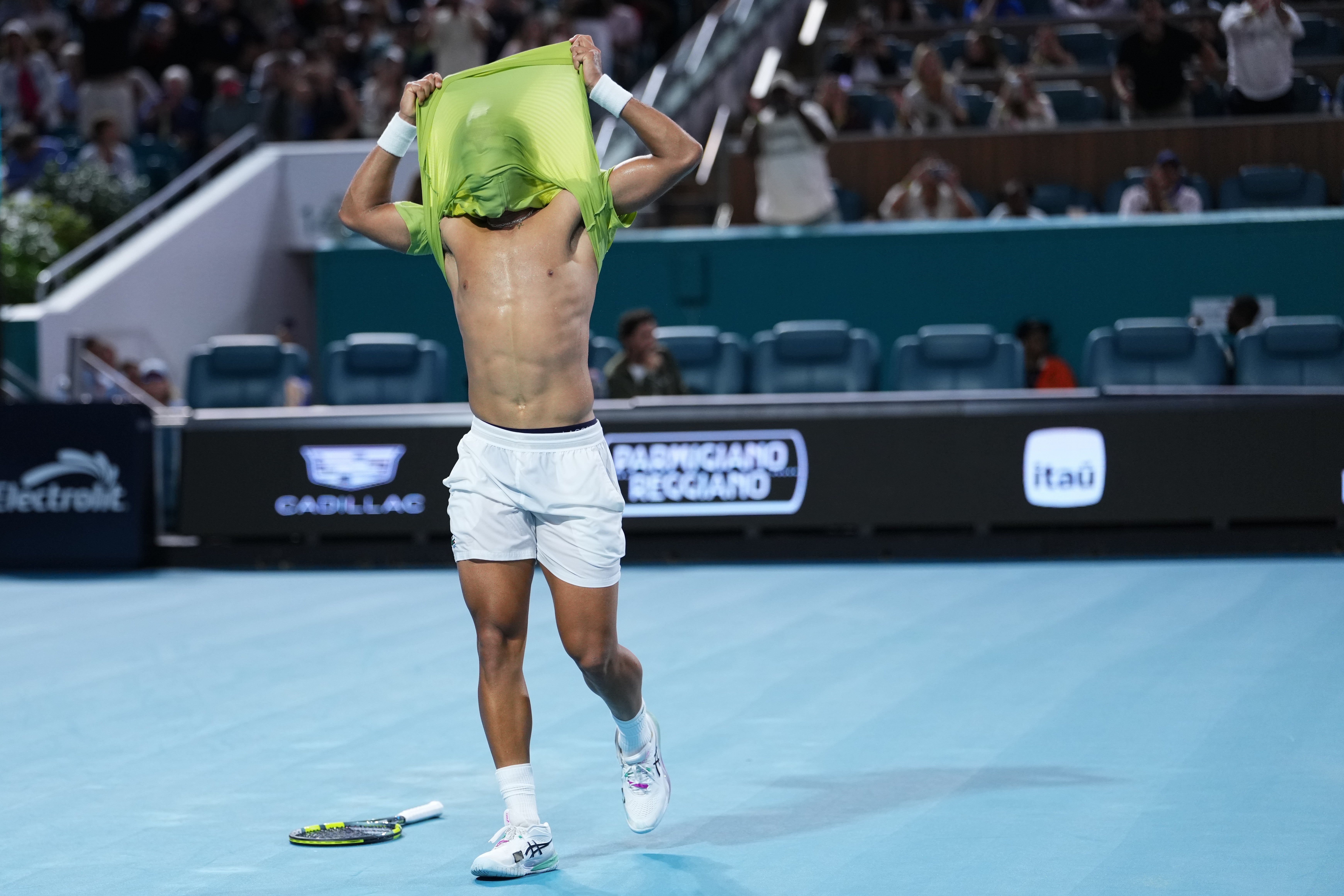 Fils celebrates his 7-6, 6-7, 7-6 win over Paul, where he saved four match points