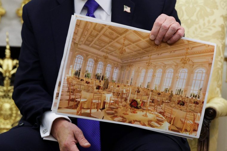 WASHINGTON, DC - OCTOBER 22: U.S. President Donald Trump displays a rendering of his proposed $250 million White House ballroom as he meets with NATO Secretary General Mark Rutte in the Oval Office of the White House on October 22, 2025 in Washington, DC. Less than a week after hosting Ukrainian President Volodymyr Zelensky, Trump is meeting with Rutte to discuss the war in Ukraine. (Photo by Alex Wong/Getty Images)