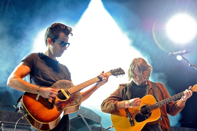 GREENWICH, ENGLAND - JULY 27: Mark Ronson (L) and Dave McCabe of The Zutons perform'Valerie' as a tribute to the late Amy Winehouse on stage during Greenwich Summer Sessions at the Old Royal Naval College on July 27, 2011 in Greenwich, United Kingdom. (Photo by Matt Kent/Redferns)
