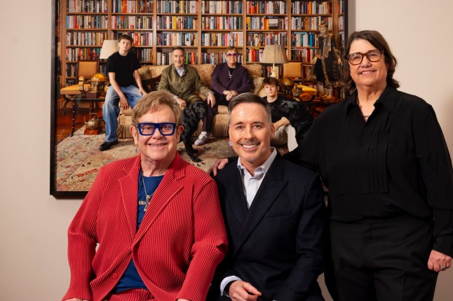 EMBARGOED TO 0001 TUESDAY MARCH 3 EDITORIAL USE ONLY Undated handout photo issued by National Portrait Gallery?of (left to right) Sir Elton John, David Furnish and Catherine Opie at the unveiling of Elijah, David, Elton and Zachary (2025) by Catherine Opie, at the National Portrait Gallery in London. The portrait capturing Sir Elton; his husband, filmmaker David Furnish; their two children, Zachary and Elijah Furnish-John; and their two Labradors, Joseph and Jacob, in their family home in Old Windsor has been unveiled at the National Portrait Gallery. Issue date: Tuesday March 03, 2026. PA Photo. Taken by photographer Catherine Opie, the portrait can be found in the gallery's Mary Weston Gallery from Tuesday, with the unveiling also marking the opening of the exhibition Catherine Opie: To Be Seen. Photo credit should read: David Parry/National Portrait Gallery/PA Wire NOTE TO EDITORS: This handout photo may only be used for editorial reporting purposes for the contemporaneous illustration of events, things or the people in the image or facts mentioned in the caption. Reuse of the picture may require further permission from the copyright holder.