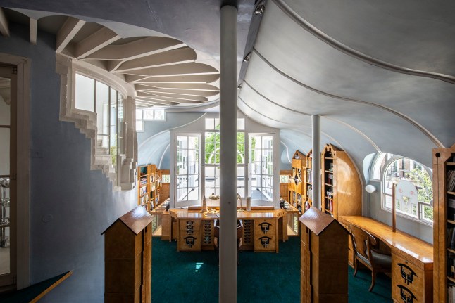 The Architectural Library is Charles? study with a tent-like roof painted like the sky; it is a ?City of Books? designed by Charles so that each bookshelf relates to the thematic style or individual architect whose books are collected therein. Picture: Sue Barr