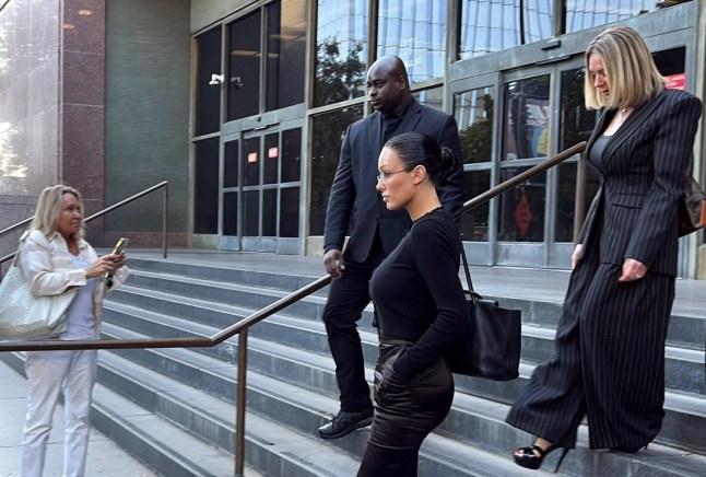Bianca Censori, wife of musician Ye, formerly known as Kanye West, leaves a Los Angeles courthouse after testifying in a lawsuit over the renovation of Ye's Malibu mansion, in Los Angeles, California, U.S., March 5, 2026. Picture taken with a mobile phone. REUTERS/Elizabeth Mendez