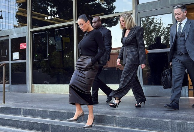 Bianca Censori, wife of musician Ye, formerly known as Kanye West, leaves a Los Angeles courthouse after testifying in a lawsuit over the renovation of Ye's Malibu mansion, in Los Angeles, California, U.S., March 5, 2026. Picture taken with a mobile phone. REUTERS/Elizabeth Mendez