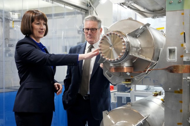 DARESBURY, ENGLAND - SEPTEMBER 22: Chancellor of the Exchequer, Rachel Reeves (L), and UK Prime Minister, Keir Starmer (R), during a visit to PsiQuantum on September 22, 2024 in Daresbury, England. PsiQuantum, the world???s largest quantum company, is based in the Liverpool City Region at Daresbury. Backed by ??9 million of UK government funding, it is PsiQuantum???s first research and development facility anywhere outside the US. Their aim is to build the world???s first large scale quantum computer, capable of solving complex problems. (Photo by Christopher Furlong/Getty Images)