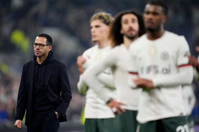 Chelsea manager Liam Rosenior (left) on the pitch after the Premier League match at Hill Dickinson Stadium, Liverpool. Picture date: Saturday March 21, 2026. PA Photo. Photo credit should read: Nick Potts/PA Wire. RESTRICTIONS: EDITORIAL USE ONLY No use with unauthorised audio, video, data, fixture lists, club/league logos or 