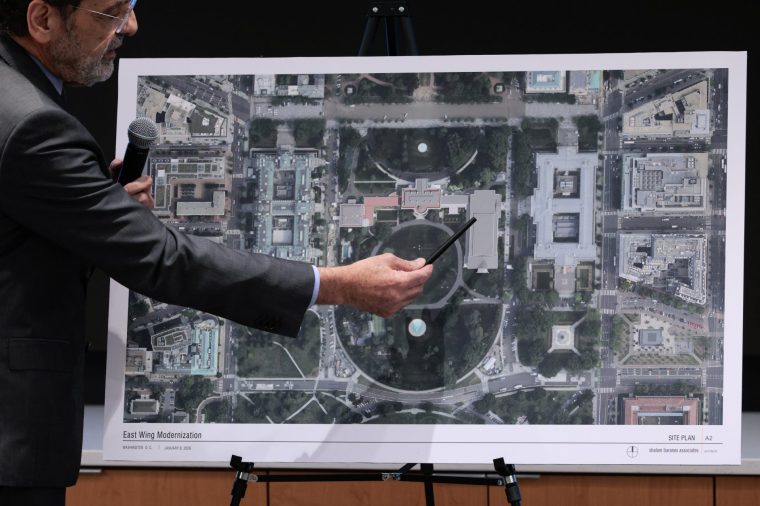 WASHINGTON, DC - JANUARY 08: Architect Shalom Baranes shows a site plan for a new $400 million White House ballroom during a meeting of the National Capital Planning Commission on January 08, 2026 in Washington, DC. The commission met to discuss U.S. President Donald Trump's planned construction of a new ballroom at the White House which began months ago and will replace the recently demolished two-story East Wing. (Photo by Chip Somodevilla/Getty Images)