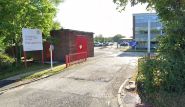 College in Wigan says student has suspected meningitis but the risk to others is 'very low'