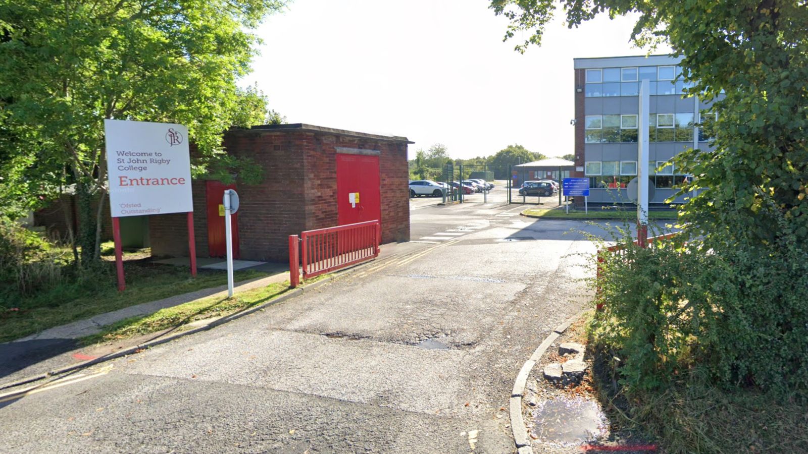 College in Wigan says student has suspected meningitis but the risk to others is 'very low'