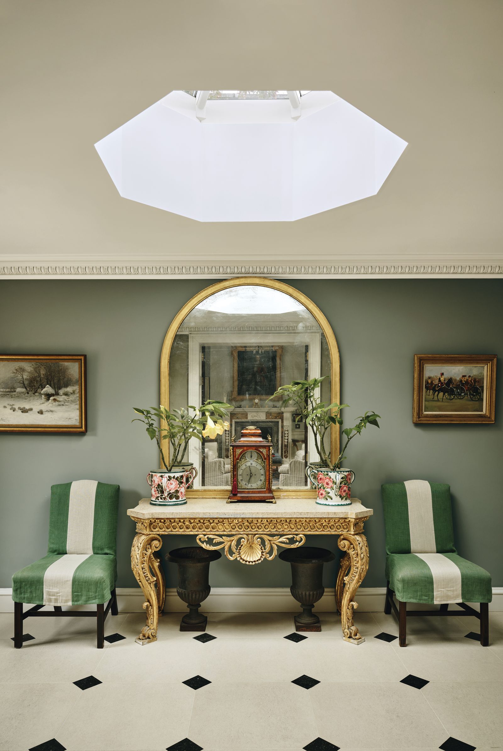 Image may contain Plant Desk Furniture Table Chair Art Painting Architecture Building Dining Room and Dining Table