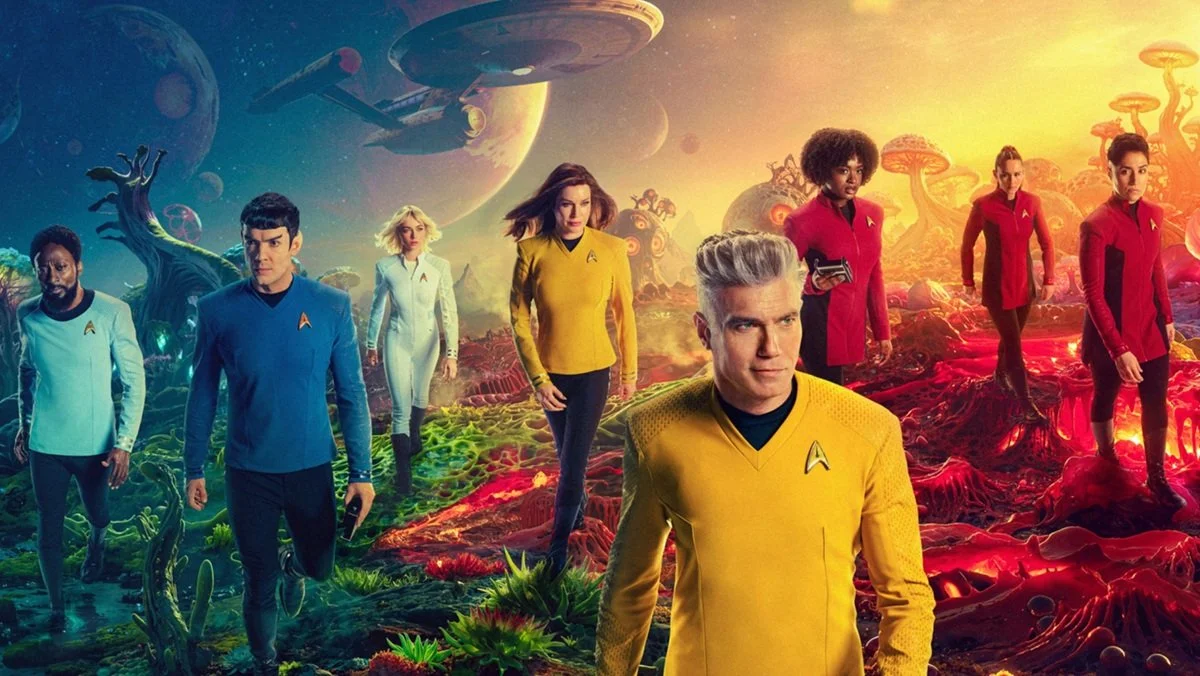 The crew of the Enterprise on a planet in key art for Star Trek: Strange New Worlds season 3.