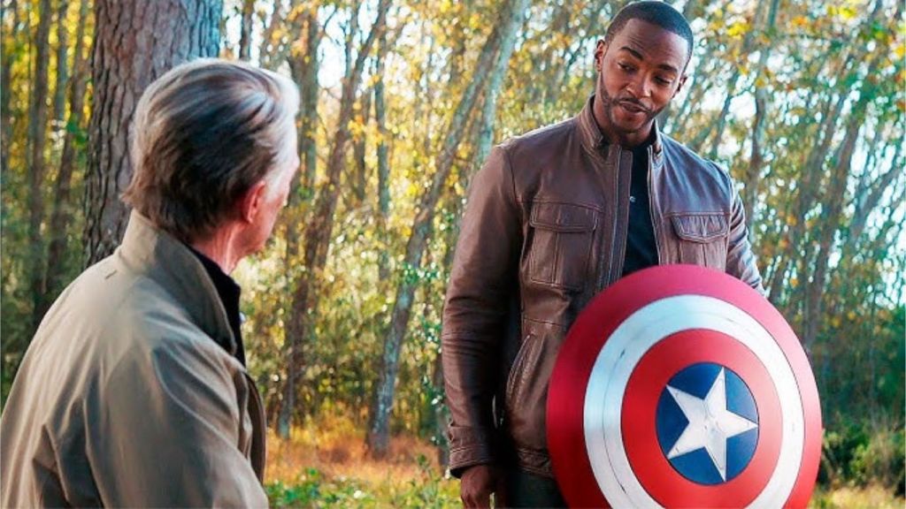 Steve Rogers gives Sam Wilson his shield
