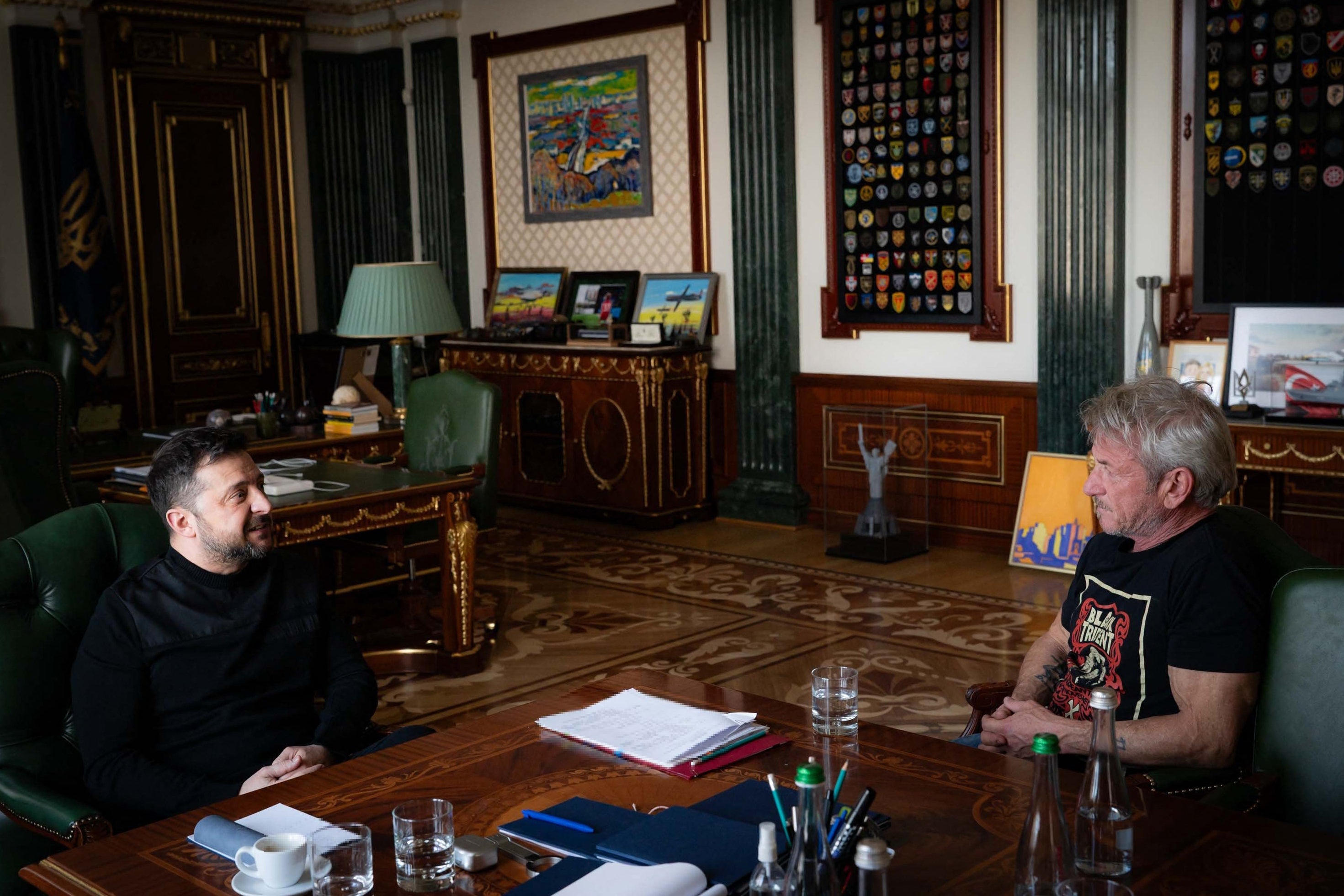 Ukraine's president Volodymyr Zelensky meets with US actor Sean Penn at his office in Kyiv