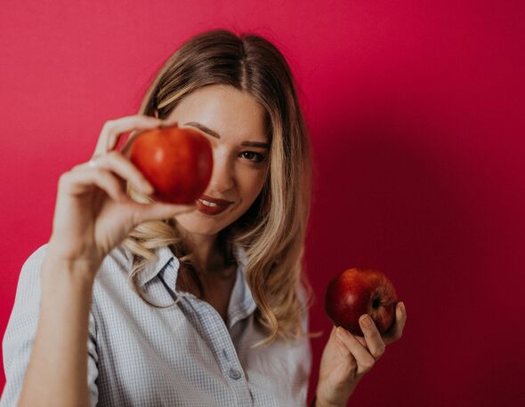 Woman with apples
