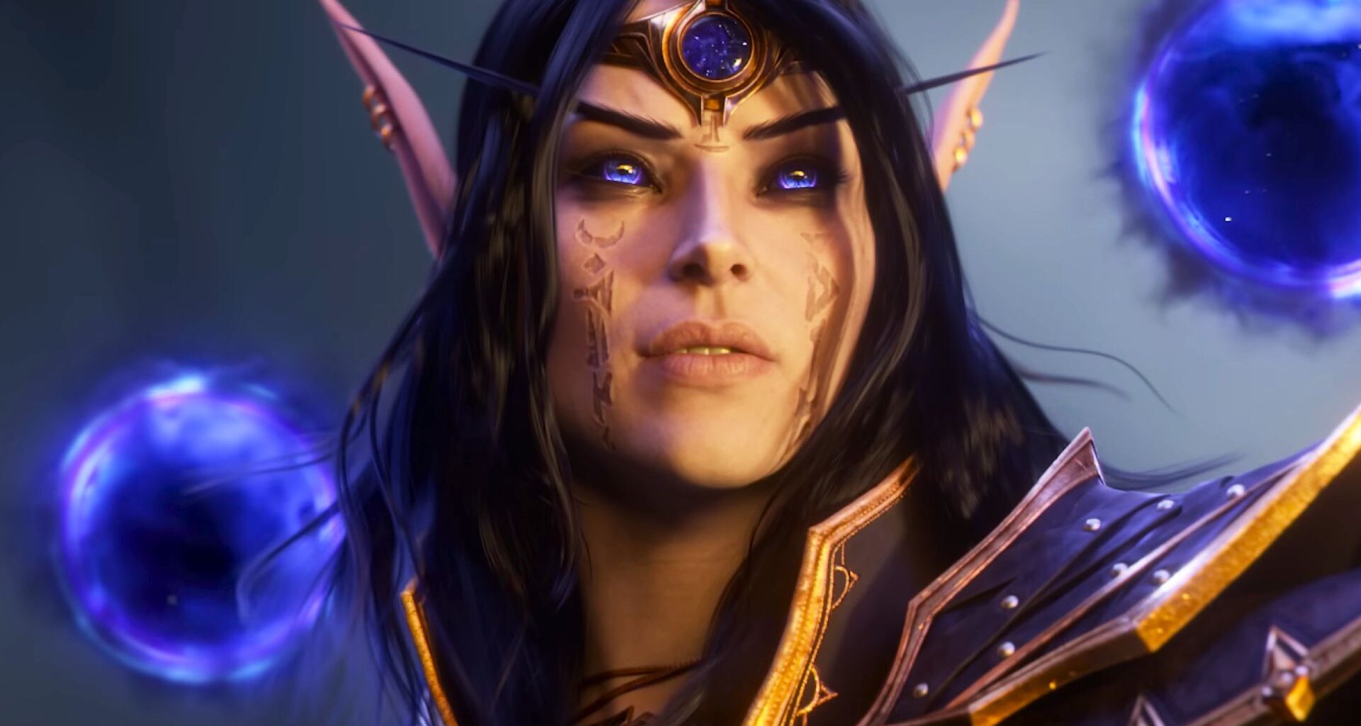 A screencap of the World of Warcraft: Midnight cinematic trailer. An elf with long dark hair and purple eyes faces a bright light in the distance. Two dark blue orbs hover over her plated shoulder pads.