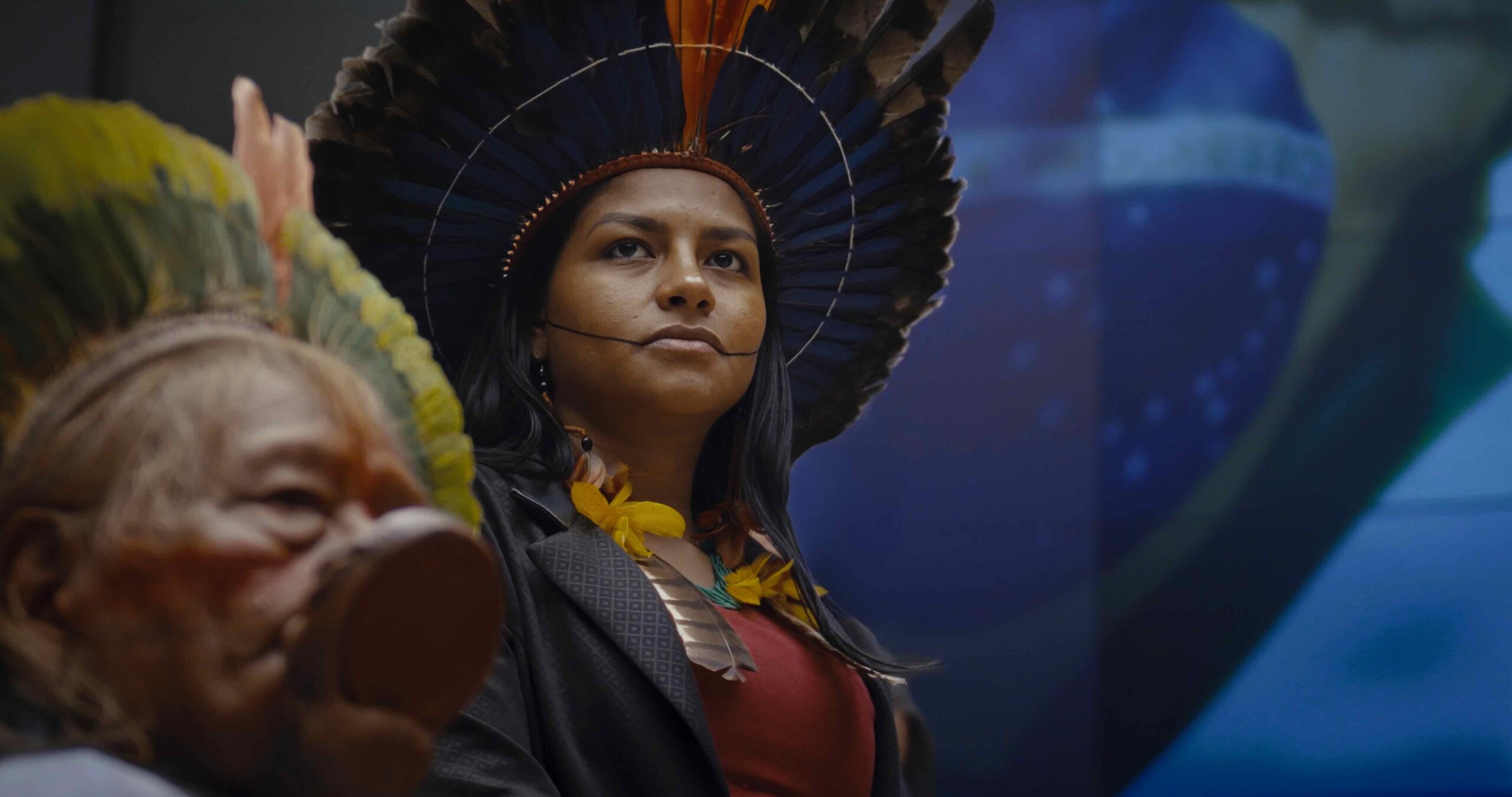 Juma Xipaia is central to the movie which showcases her ongoing effort to confront illegal gold miners, land grabbers and multinational corporations threatening the Amazon’s forests. Image © Malaika Pictures. 