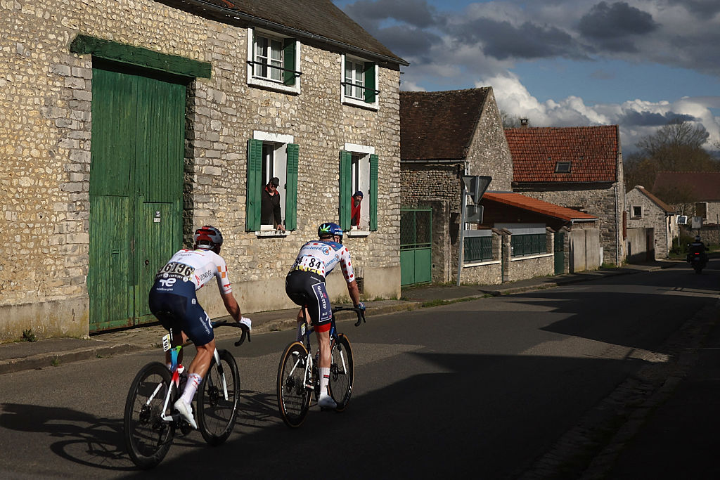 Soudal Quick-Step's Danish rider Casper Pedersen and TotalEnergies' French rider Mathis Le Berre (L) ride in a breakaway during the 2nd stage of the Paris-Nice cycling race, 187 km between &Eacute;p&ocirc;ne and Montargis, on March 9, 2026. (Photo by Anne-Christine POUJOULAT / AFP)