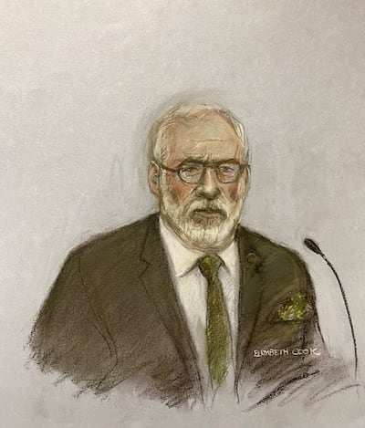 Court artist sketch by Elizabeth Cook of former Sinn Féin president Gerry Adams, wearing a sprig of shamrock in the top pocket of his suit,  giving evidence at the Royal Courts of Justice, in central London, where a civil claim is being brought against him for just £1 in damages by three men who were injured in Provisional IRA bombings in Britain in the 1970s and 1990s. Image: Elizabeth Cook/PA Wire