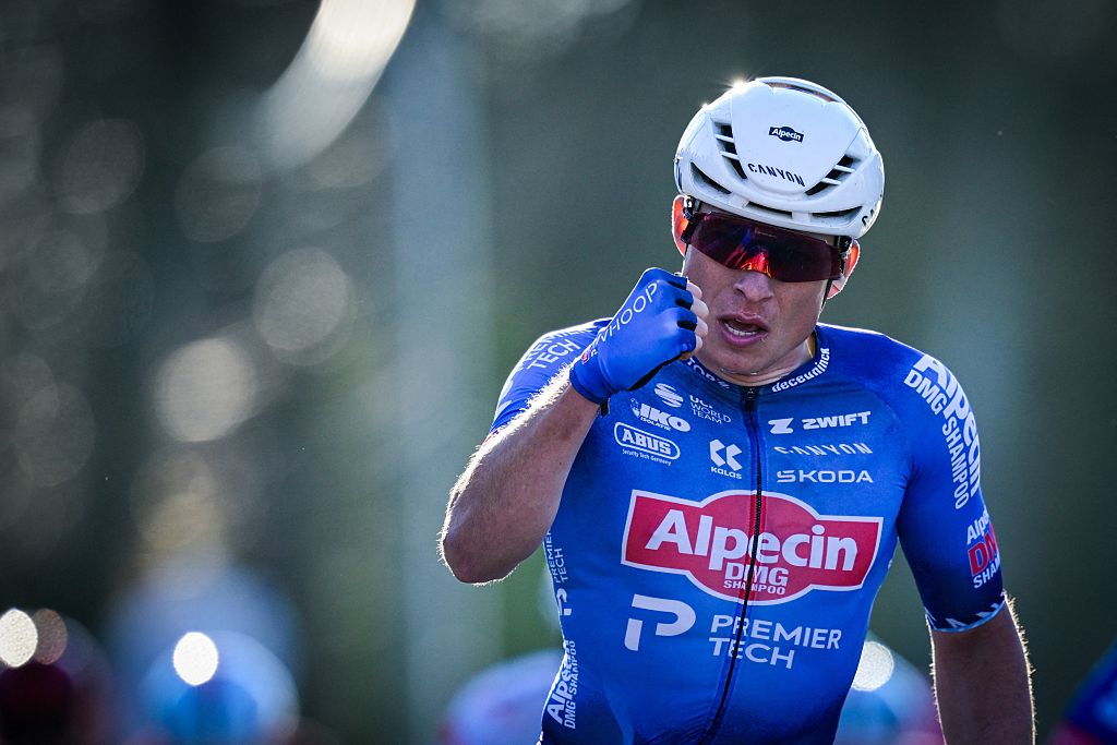 Belgian Jasper Philipsen of Alpecin-Premier Tech celebrates as he crosses the finish line to win the 'Nokere Koerse' one day cycling race for men elite, 186,4 km from Deinze to Nokere, Kruisem on Wednesday 18 March 2026. BELGA PHOTO DAVID PINTENS (Photo by DAVID PINTENS / BELGA MAG / Belga via AFP)
