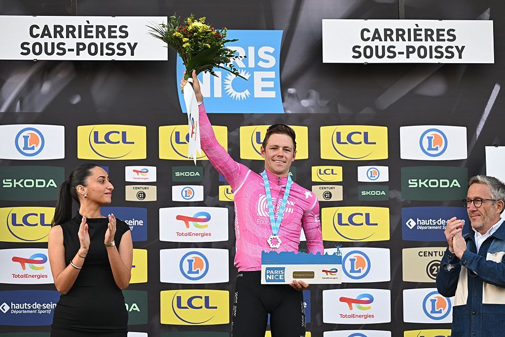 American Luke Lamperti of EF Education - EasyPost celebrates on the podium of the first stage of 84th edition of the Paris-Nice cycling race, 170,9 km from Archeres to Carrieres-sous-Poissy, Sunday 08 March 2026.BELGA PHOTO DAVID PINTENS (Photo by DAVID PINTENS / BELGA MAG / Belga via AFP)