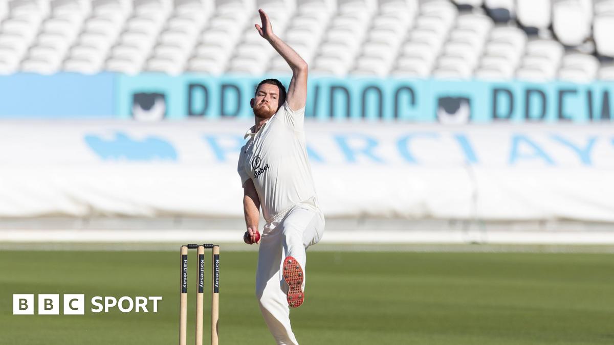Ryan Higgins in mid-delivery stride bowling for Middlesex against Gloucestershire at Lord's last season