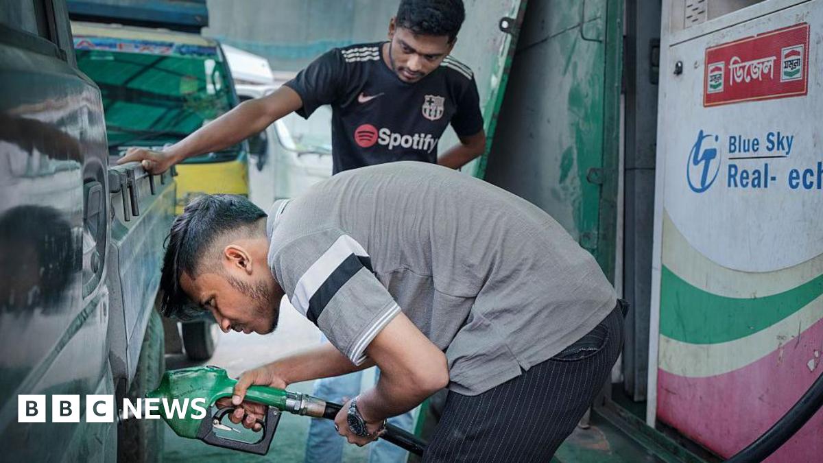 A man refuels a vehicle at a petrol station in Dhaka, Bangladesh, on Monday, March 9, 2026.