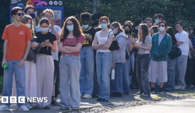 A long queue of people.