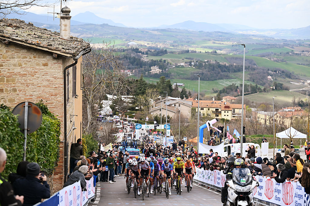 CAMERINO, ITALY - MARCH 14: A general view of the peloton compete climbing to the Camerino (635m) during the 61st Tirreno-Adriatico 2026, Stage 6 a 188km stage from San Severino Marche to Camerino 656m / #UCIWT / on March 14, 2026 in San Severino Marche, Italy. (Photo by Tim de Waele/Getty Images)