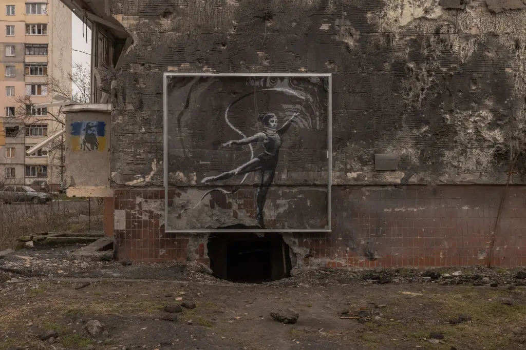 Banksy graffitied on the wreckage of damaged buildings caused by Ukraine's ongoing war with Russia (Roman Pilipey/Getty Images)