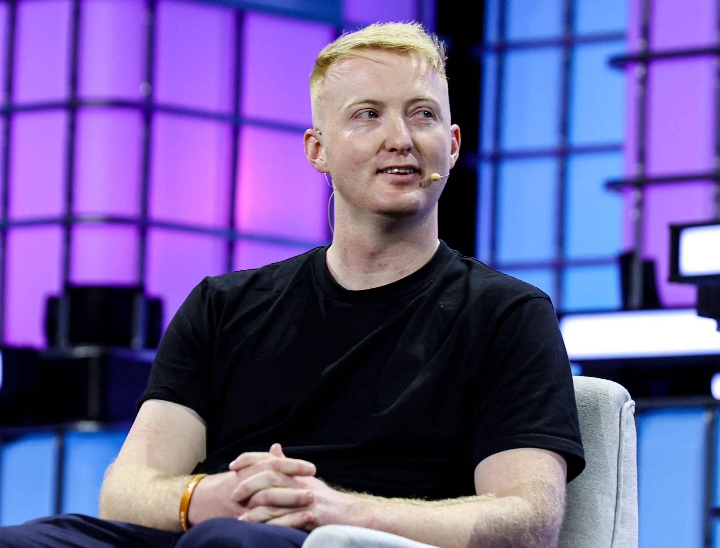 Daniel Bathurst, CPO of Nscale, speaking on the New Energy Summit stage.