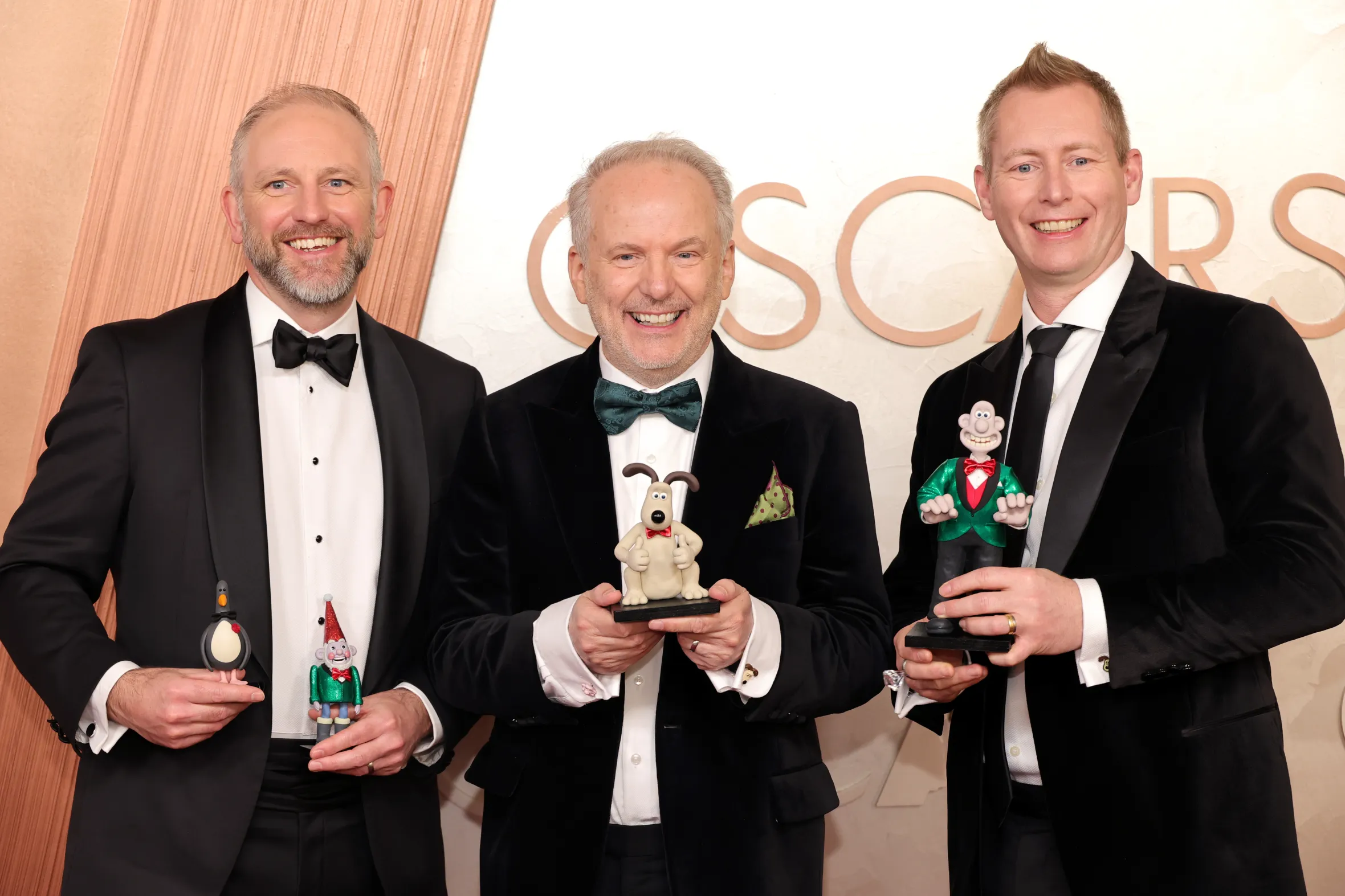 Richard Beek, Nick Park, and Merlin Crossingham attend the 97th Annual Oscars.