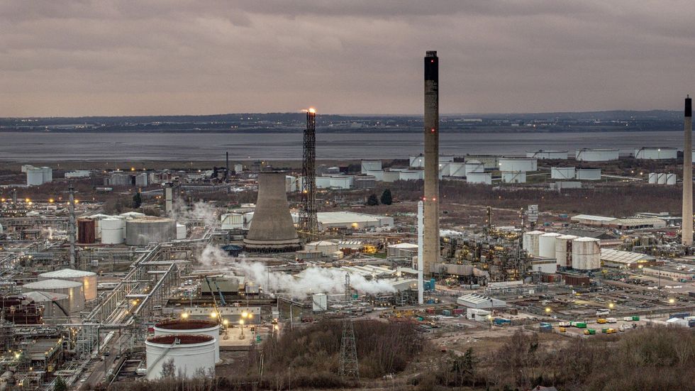 An aerial view of the Essar Oil Refinery next to the Manchester Ship Canal and the River Mersey